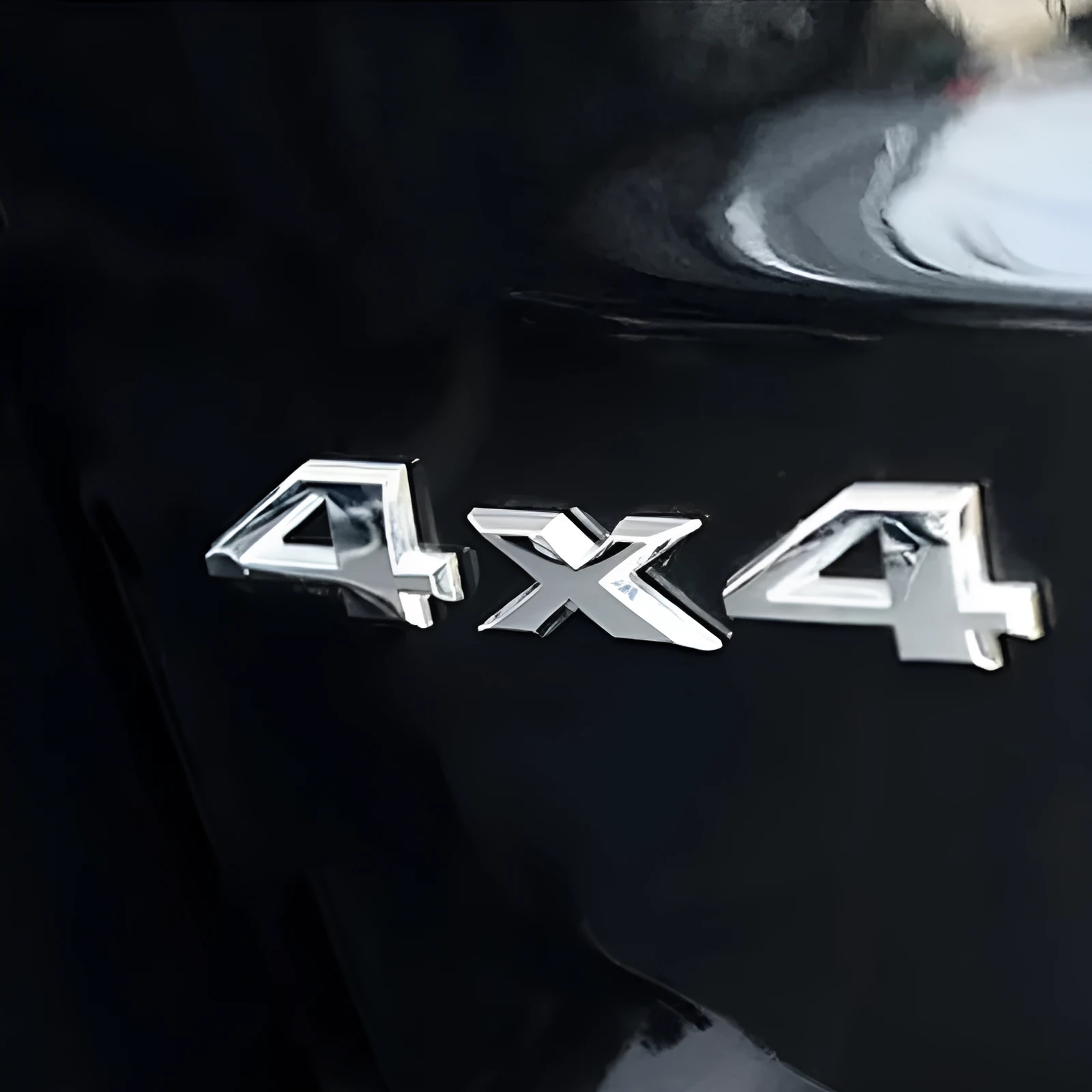 Metal 3D rear car badge sticker for 4x4 off-road vehicles in black finish, 9cm by 3.5cm