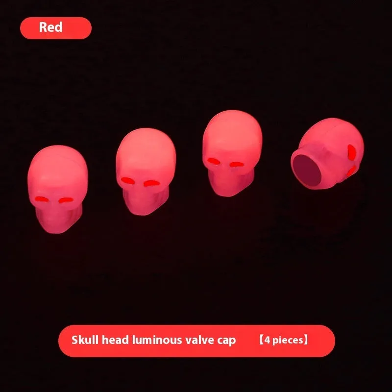 Luminous skull-shaped rubber car tyre valve cap in glow effect on a standard wheel