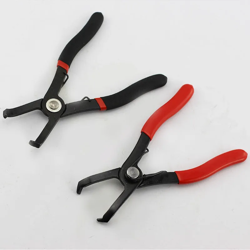 Red round nail removal pliers with PVC handles and adjustable jaws for interior trim work