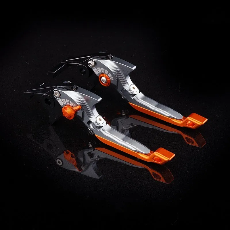 Pair of anodised metal motorcycle brake and clutch levers with adjustable length mechanism in various colour options.