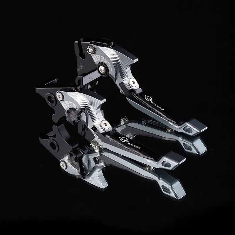 Pair of anodised metal motorcycle brake and clutch levers with adjustable length mechanism in various colour options.