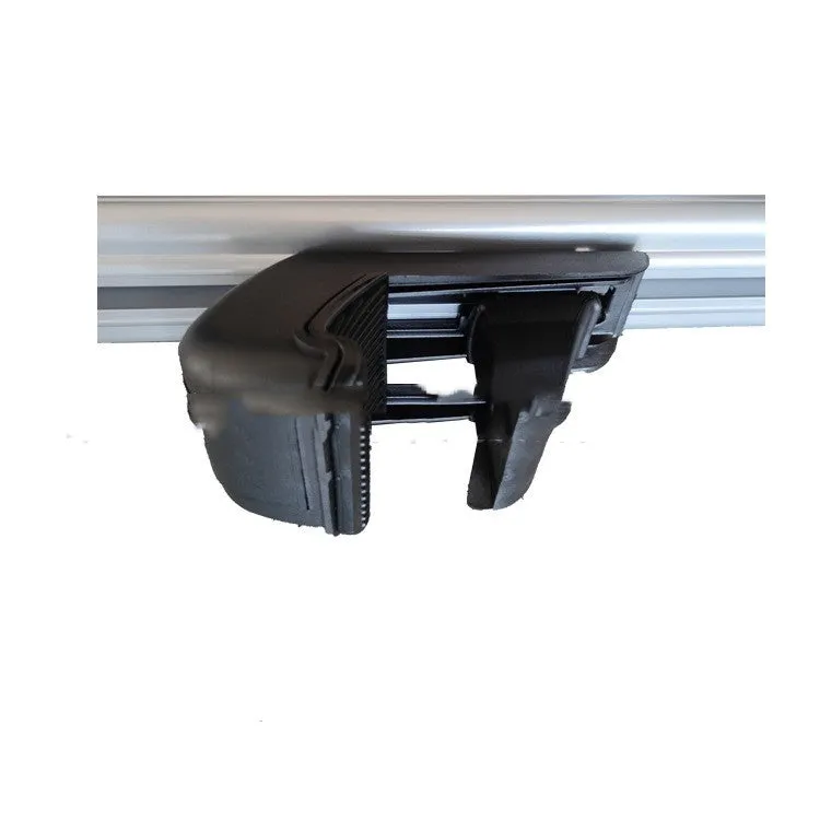 Black alloy GM SUV roof rack cross bars set showing adjustable length on vehicle roof.