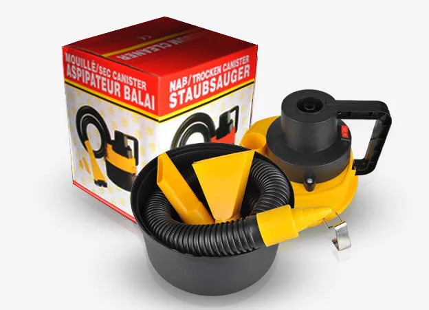 Yellow 12V wet and dry car cleaner with ABS body on a grey surface with nozzles and hose visible