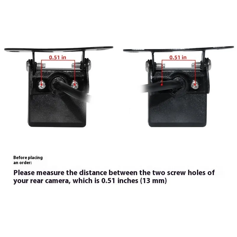 3 black metal licence plate frames with screws and screwdriver for rearview camera bracket on wooden surface