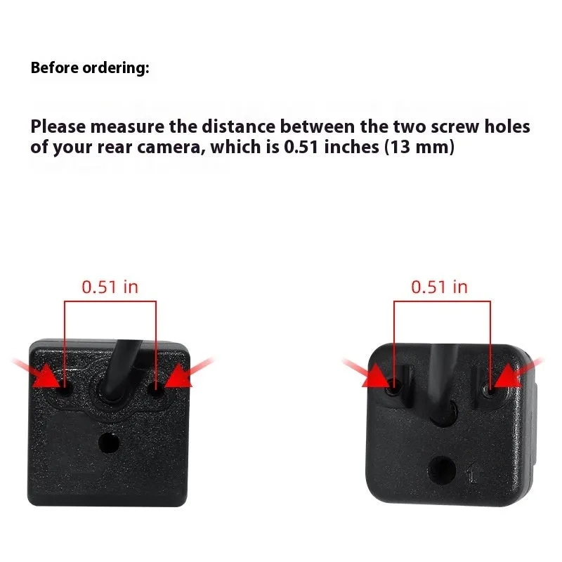 3 black metal licence plate frames with screws and screwdriver for rearview camera bracket on wooden surface