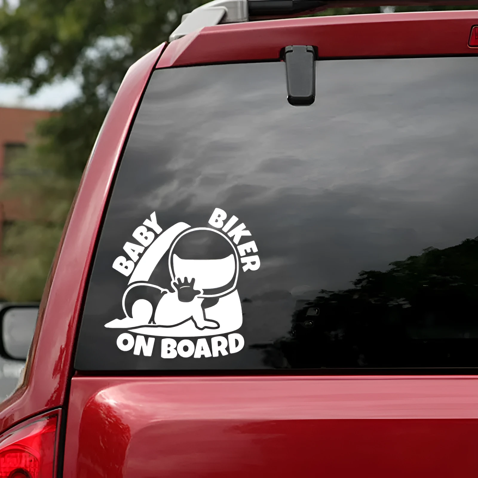 Black and white reflective BABY ON BOARD car sticker measuring 14.5 by 15 centimetres.