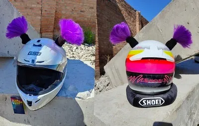 Close-up of black skyhigh braid decorative balls attached to a motorcycle helmet, showing 8cm height