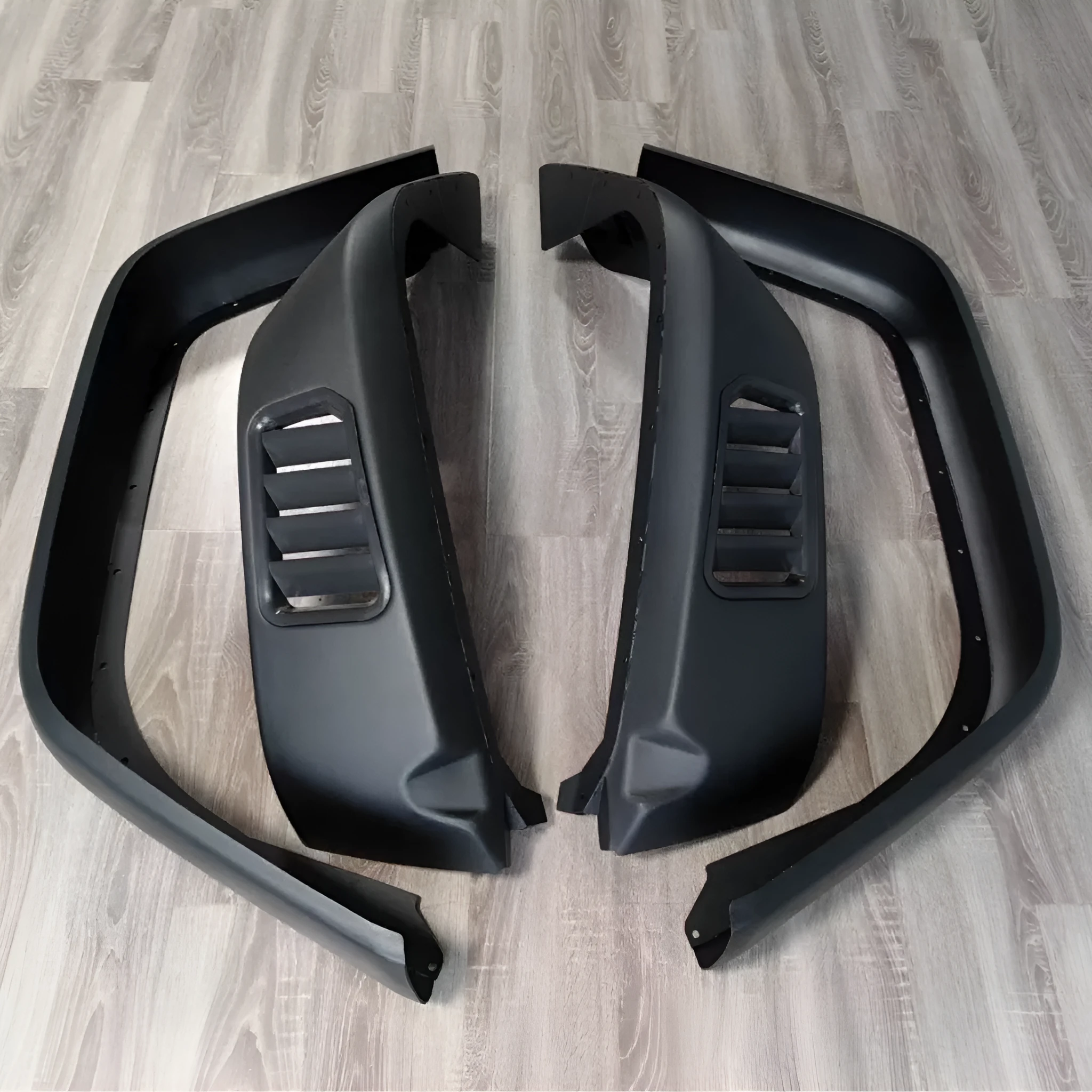 Black plastic car wheel arch set of four for universal fit on automobiles