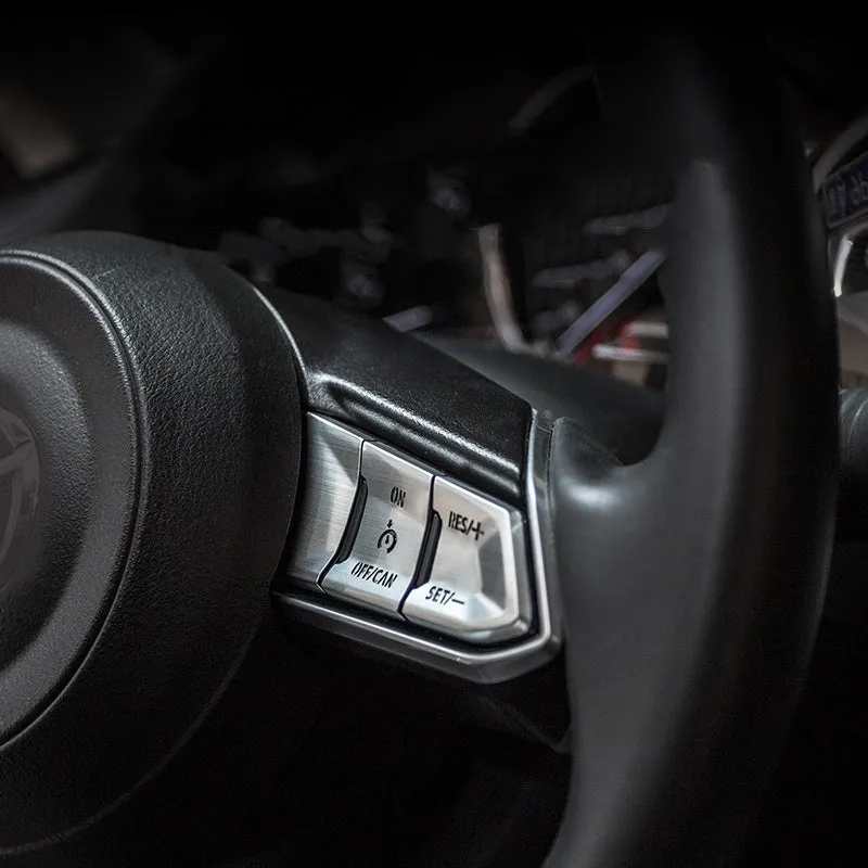 Eight aluminium alloy decorative stickers for car steering wheel in brushed red, silver, and blue finishes