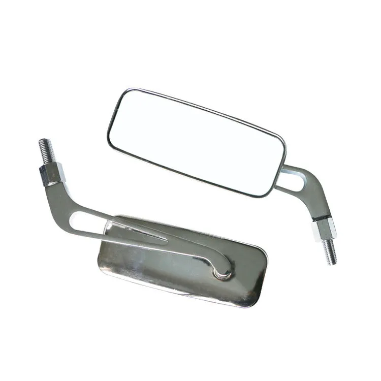 Pair of motorcycle rearview mirrors with glass surface and aluminium alloy cover in retro decor setting