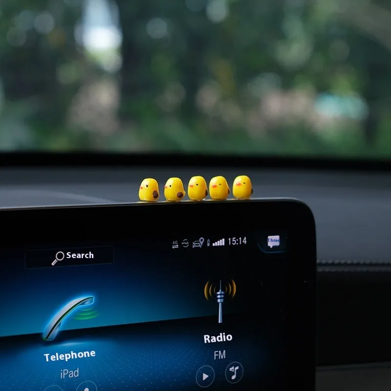 Set of small plastic yellow duck cartoon ornaments for car dashboard decoration