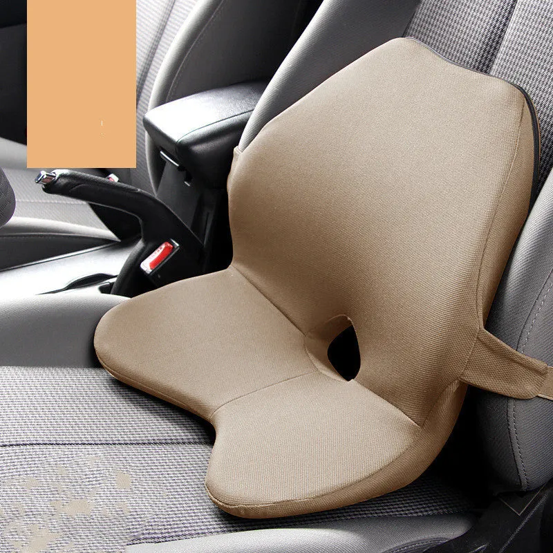 Car seat cushion with integrated memory foam waist pad and optional attached headrest in a neutral colour.