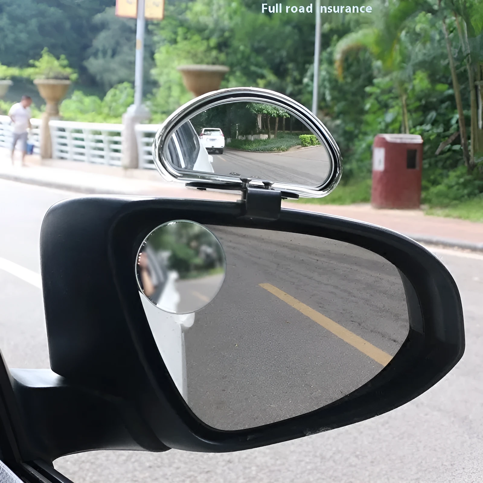 Car rear view auxiliary wide angle convex mirror in black with glass surface and plastic housing for reversing safety