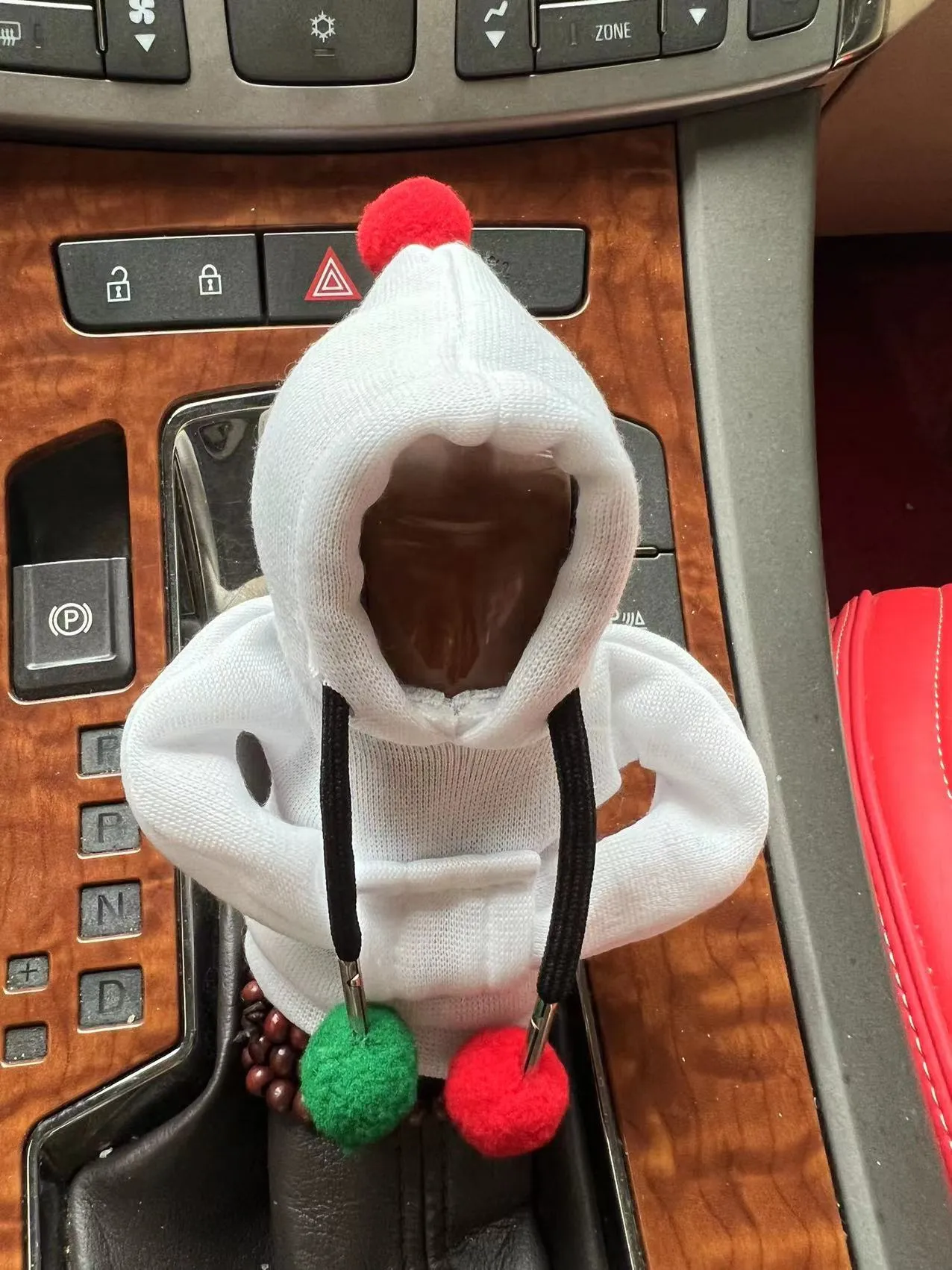 Santa Claus hooded sweatshirt car gear lever cover in pink colour on gear shift
