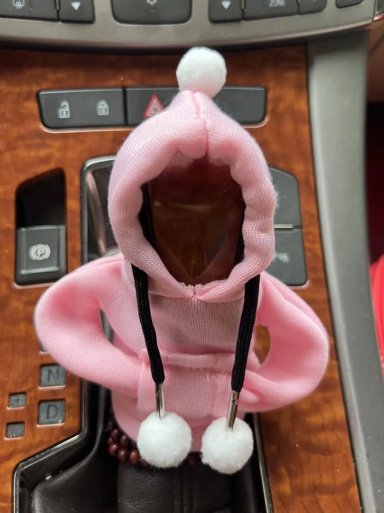 Santa Claus hooded sweatshirt car gear lever cover in pink colour on gear shift