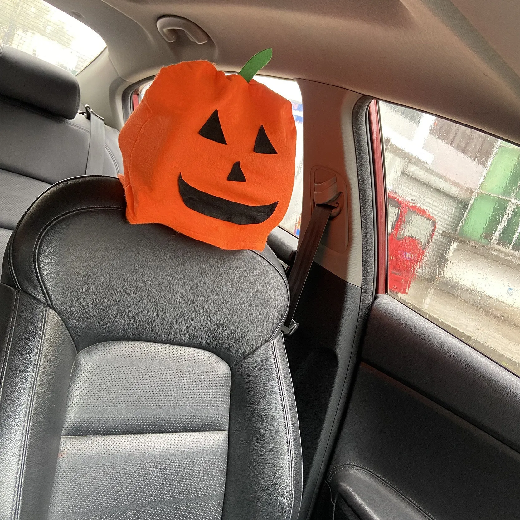 Orange pumpkin cartoon polyester Halloween decorative car chair cover on a car seat