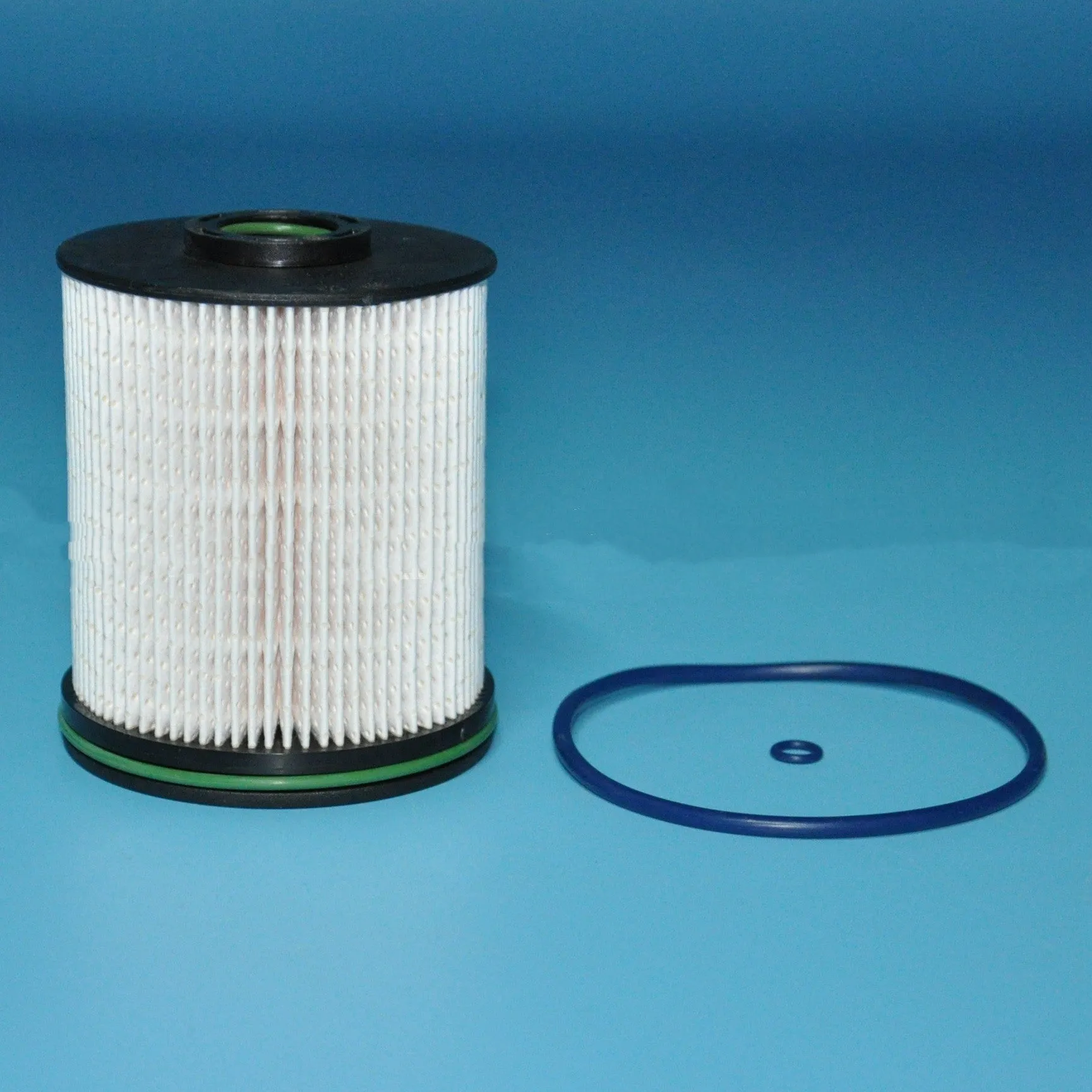 Diesel fuel filter element with gasket for Vauxhall and Opel Astra models showing 106mm height