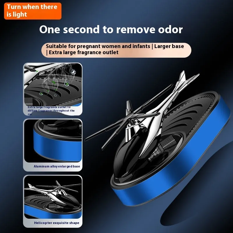 Solar car aromatherapy unit in black plastic for dashboard odour removal with fragrant tablet
