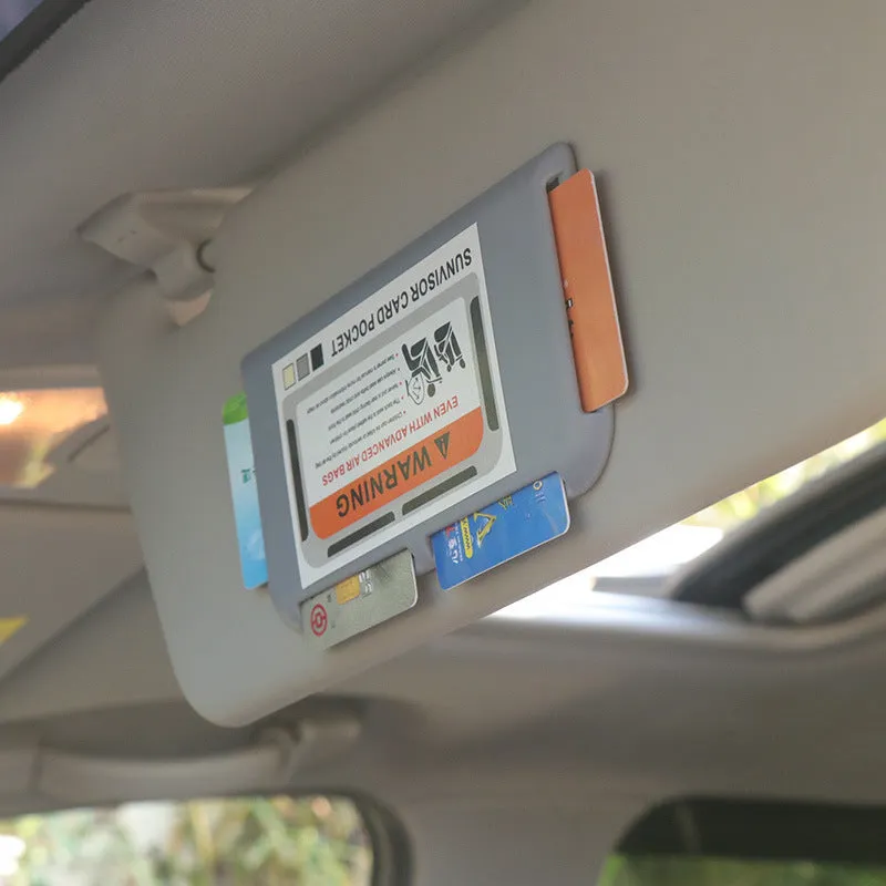 Black car sun visor card holder with four slots for driving licence and parking permits