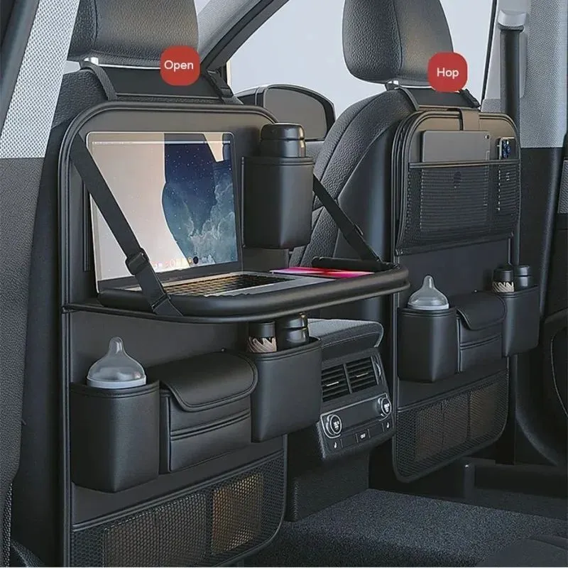 Black PU leather car seat storage bag with foldable table tray attached to a car back seat