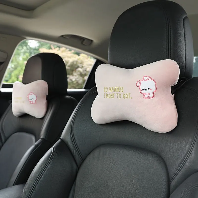 Car plush embroidery headrest shoulder pad with cute lion design in black on a car seat