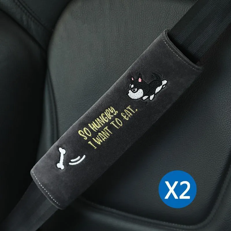 Car plush embroidery headrest shoulder pad with cute lion design in black on a car seat