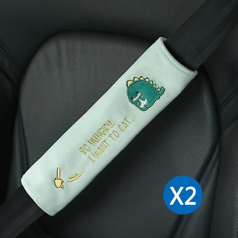 Car plush embroidery headrest shoulder pad with cute lion design in black on a car seat
