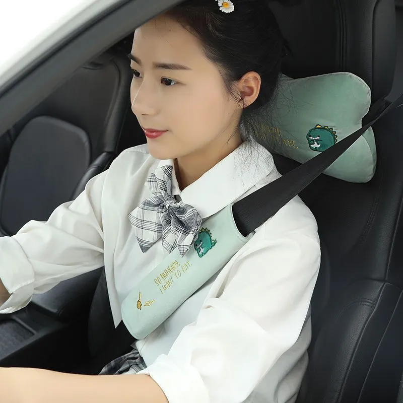 Car plush embroidery headrest shoulder pad with cute lion design in black on a car seat