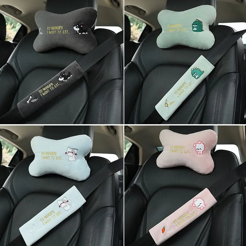 Car plush embroidery headrest shoulder pad with cute lion design in black on a car seat