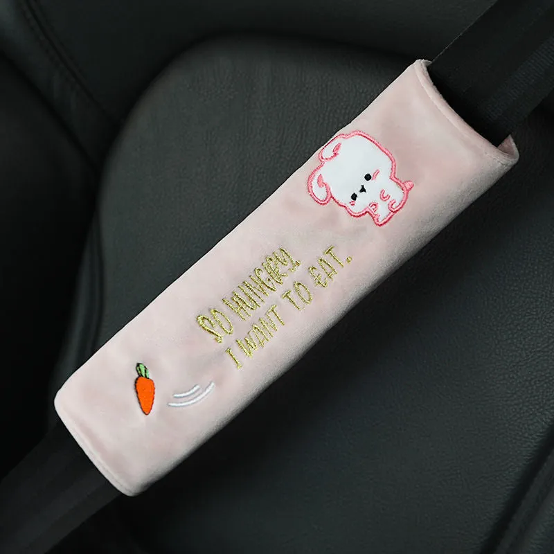 Car plush embroidery headrest shoulder pad with cute lion design in black on a car seat