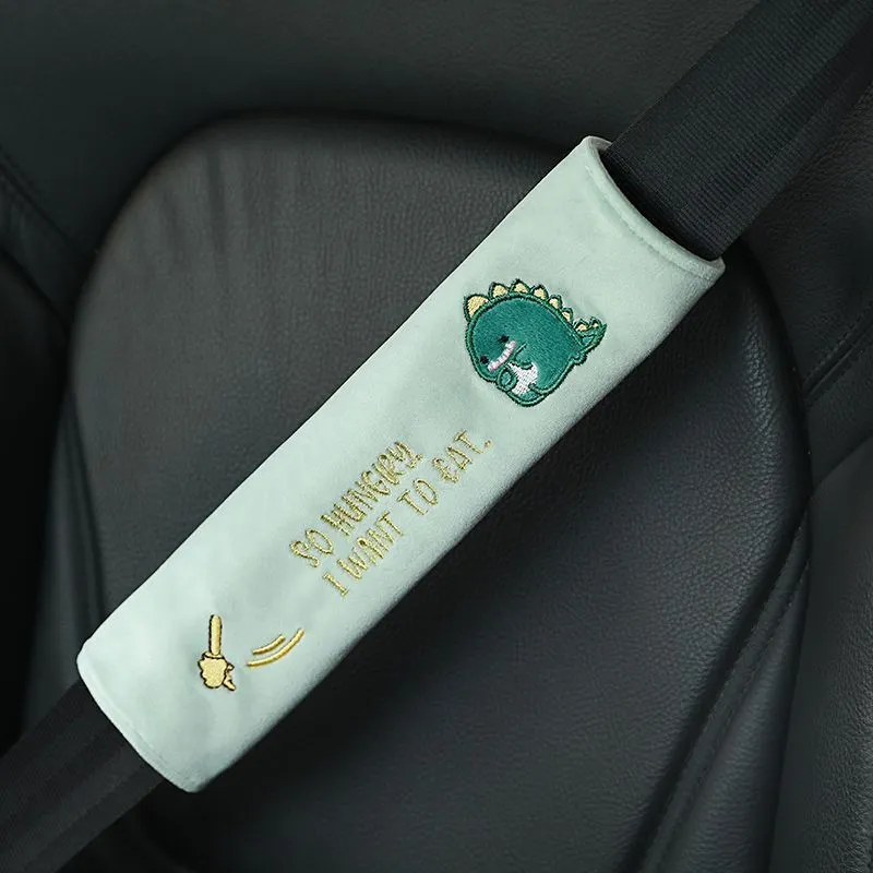 Car plush embroidery headrest shoulder pad with cute lion design in black on a car seat