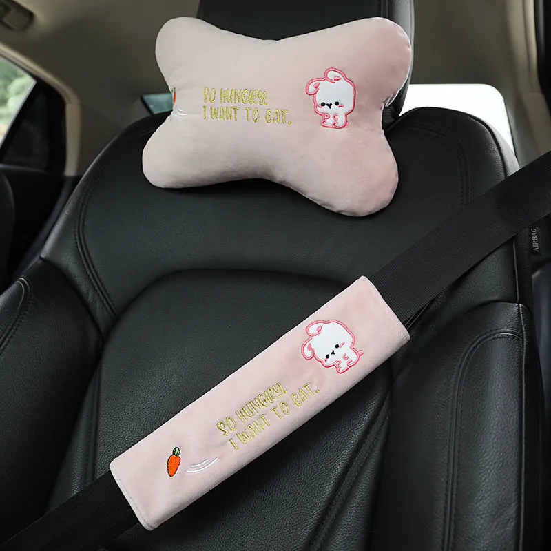 Car plush embroidery headrest shoulder pad with cute lion design in black on a car seat