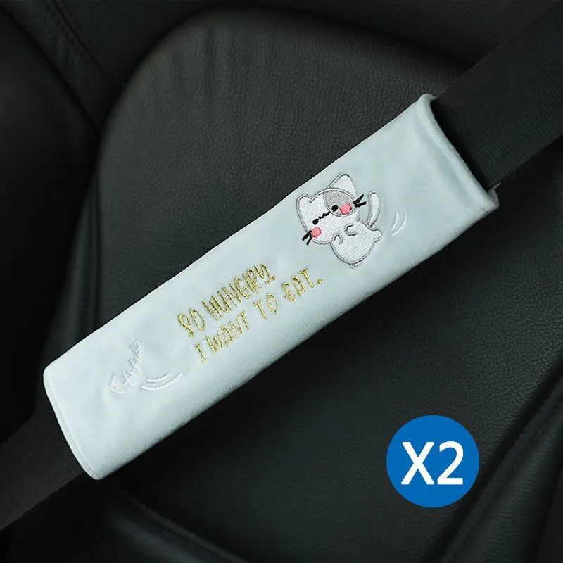 Car plush embroidery headrest shoulder pad with cute lion design in black on a car seat