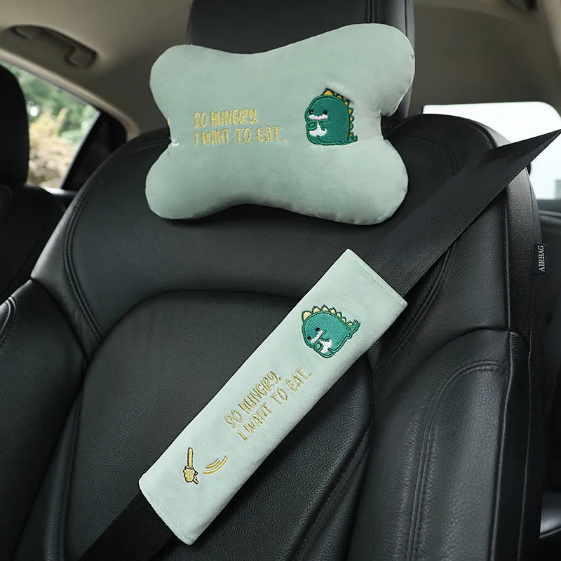Car plush embroidery headrest shoulder pad with cute lion design in black on a car seat