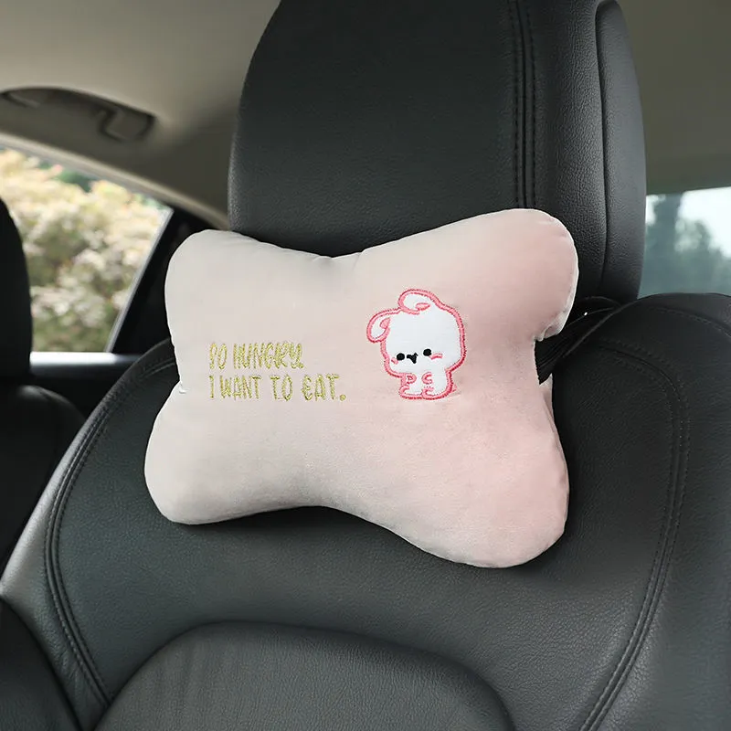 Car plush embroidery headrest shoulder pad with cute lion design in black on a car seat
