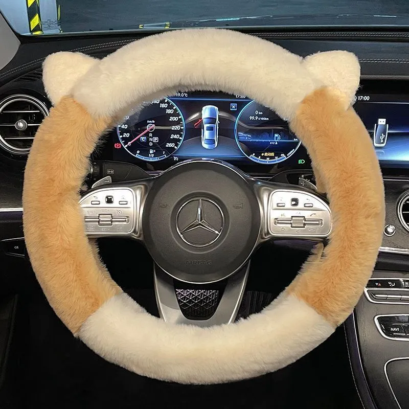 Milk tea white plush steering wheel cover with cute panda ears design on a car steering wheel