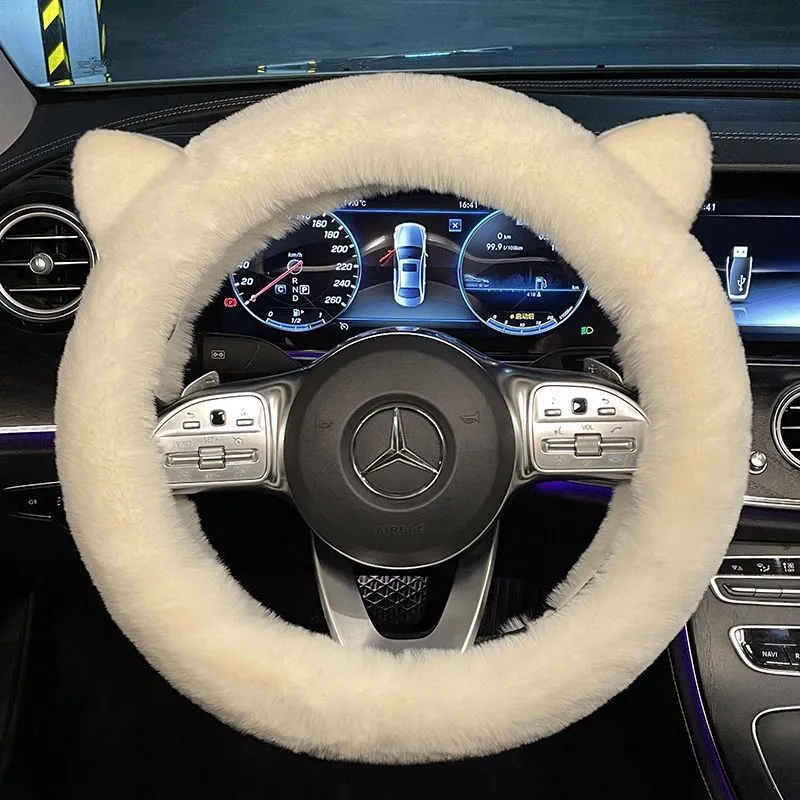 Milk tea white plush steering wheel cover with cute panda ears design on a car steering wheel