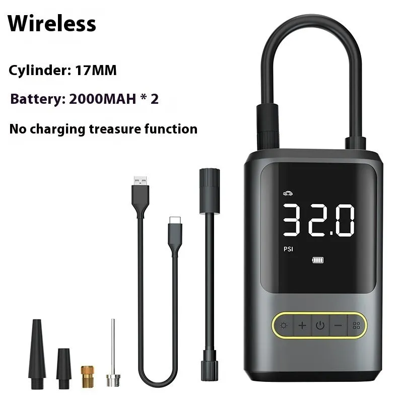Mini portable wireless car tyre inflator with LED light, black, on a garage floor