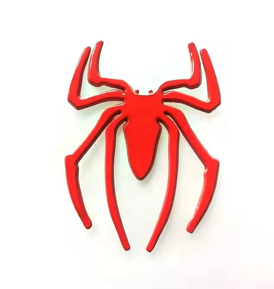 Three-dimensional metal spider bumper sticker in metallic finish measuring 7cm by 5cm