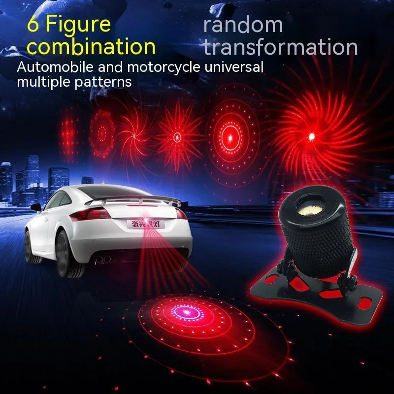 Aluminium housing laser fog lamp with red beam, showing adjustable mount and wiring for 12-24V vehicles.