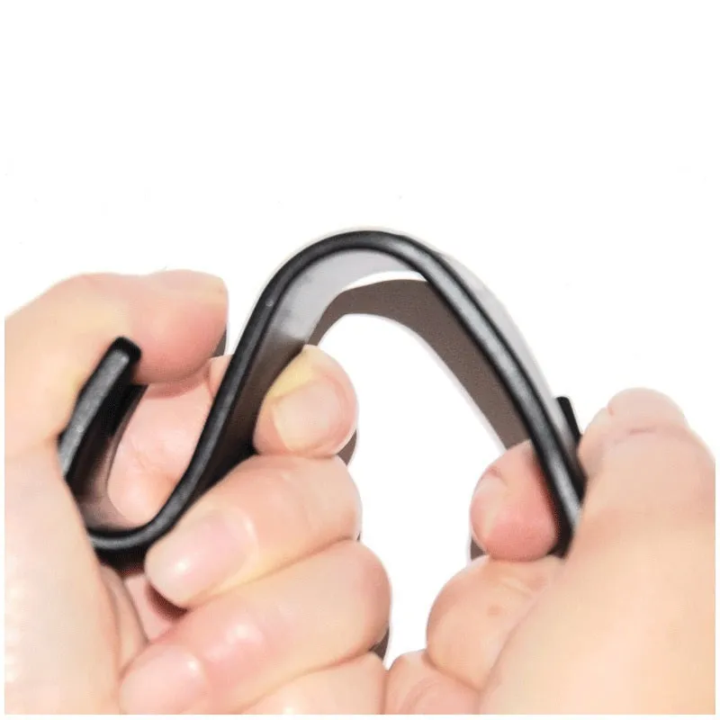 Set of two black OPP car headrest hangers clipped on seat back