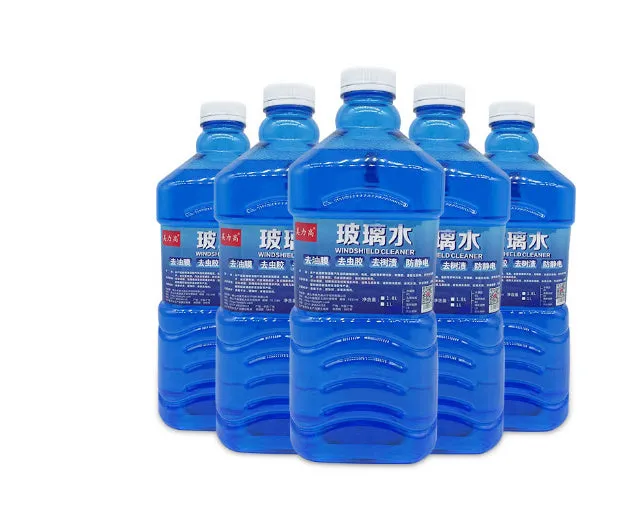 Blue windshield washer fluid in 1.8L bottle with car wiper application