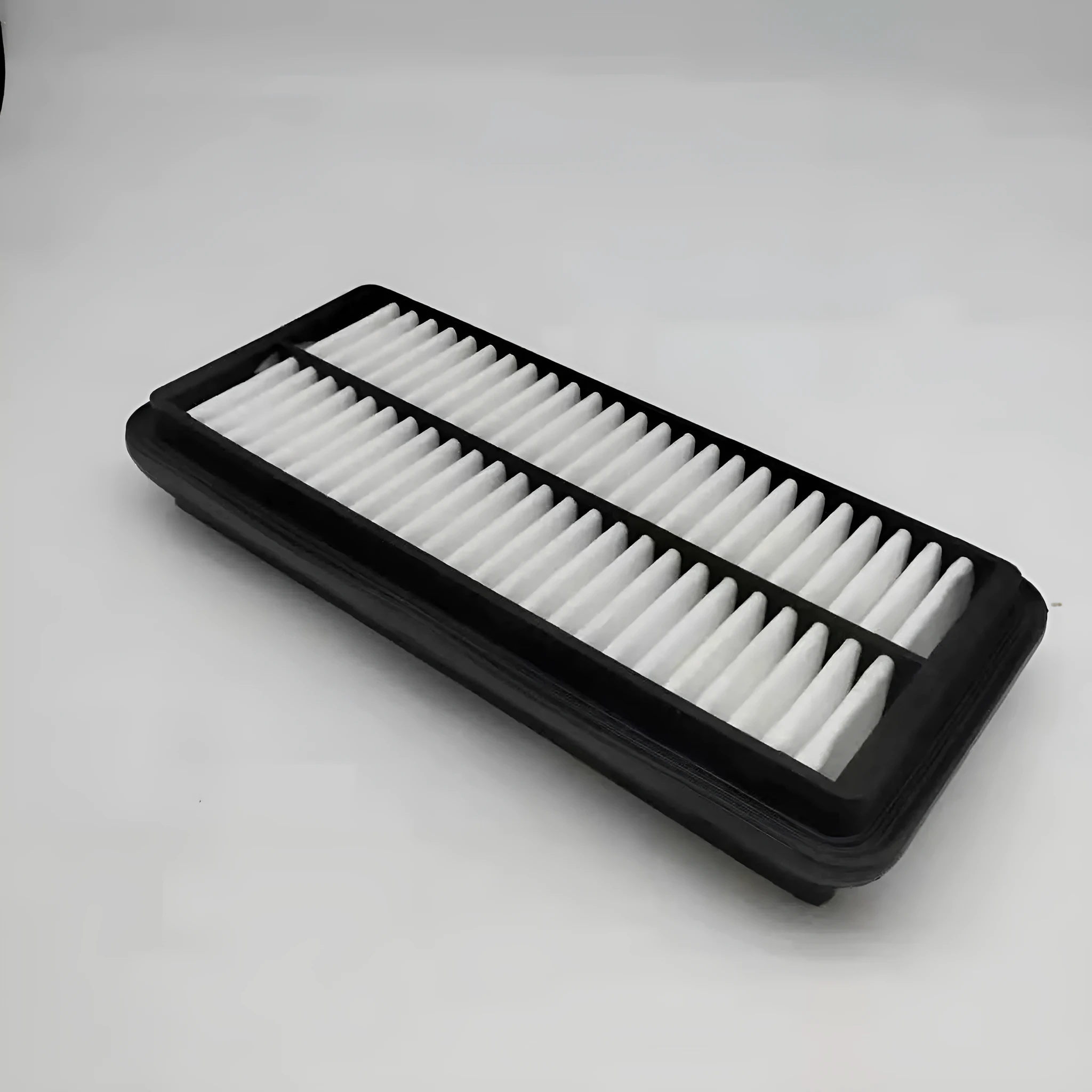 Black rectangular car air filter measuring 256mm by 113mm by 40mm.