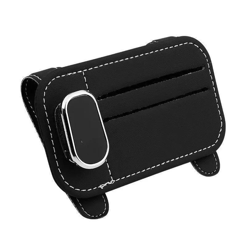 Beige leather car sun visor organiser holding cards and a pair of sunglasses.