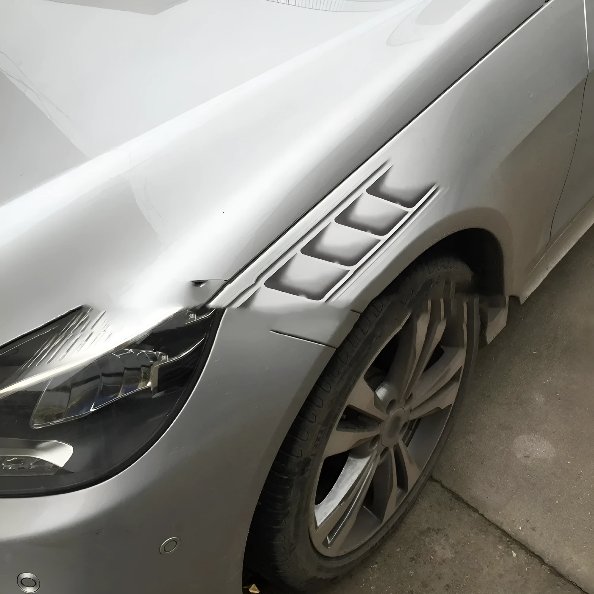 Grey imitation car air outlet vent sticker 40x10cm on a vehicle body panel with strong adhesive PET material