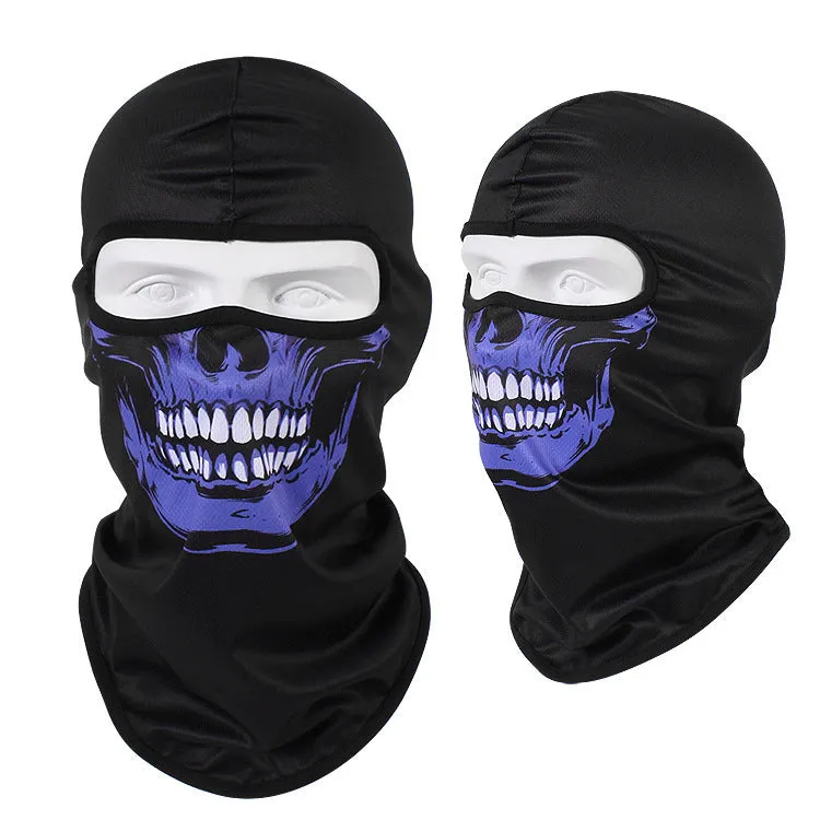 Motorcycle skull mask balaclava in Bakool silk fabric showing skull design, laid flat to show 36x29cm size.