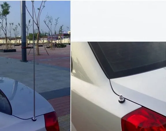 Automatic car radio antenna booster kit with black base and stainless steel mast on a white background