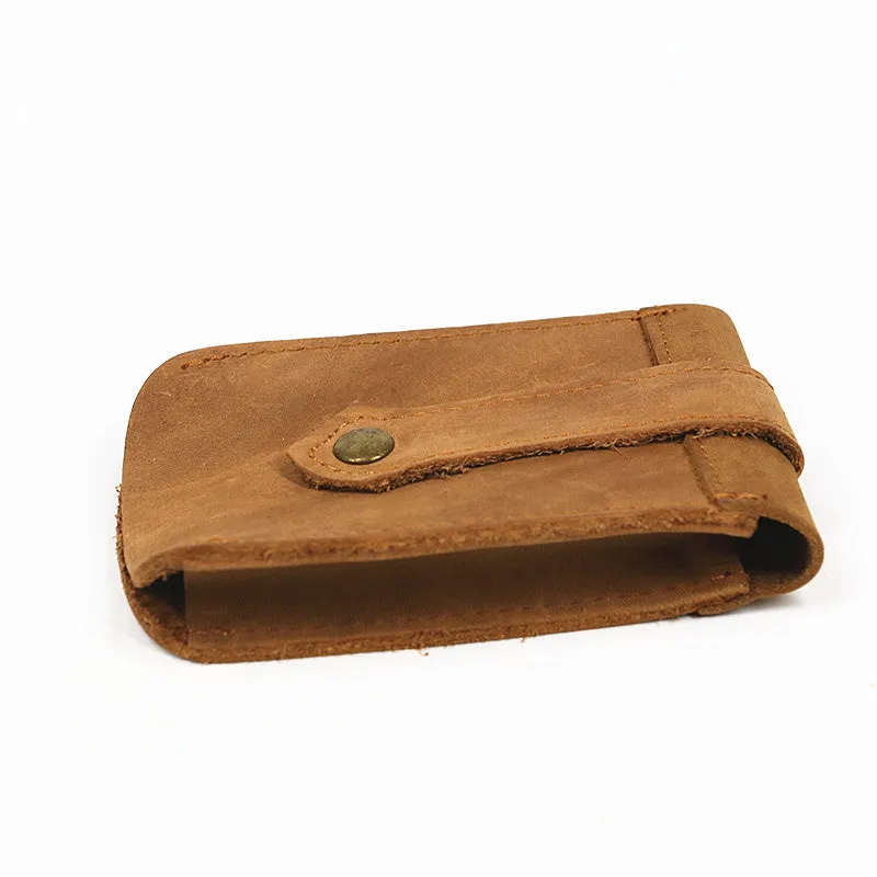 Crazy horse leather key case 7cm by 11.5cm in dark brown colour lying flat