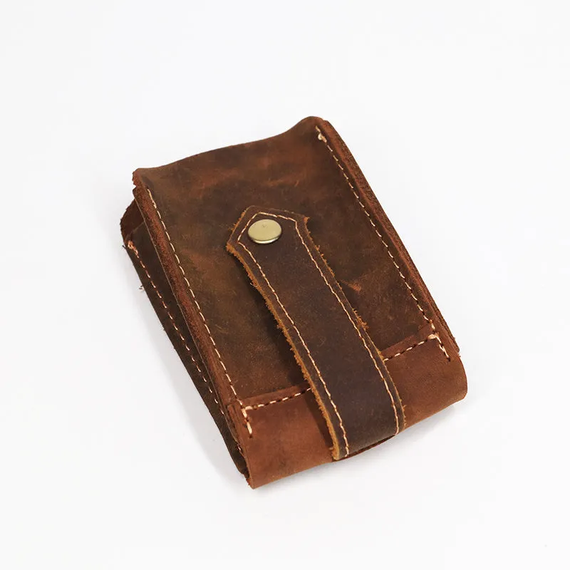 Crazy horse leather key case 7cm by 11.5cm in dark brown colour lying flat
