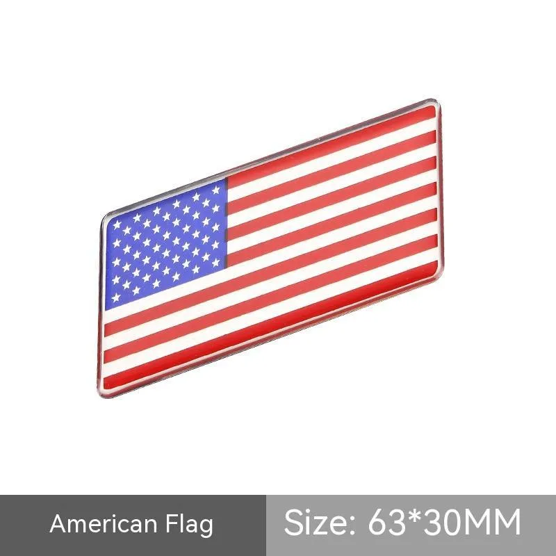 Aluminium national flag car sticker with metal crystal tail tag measuring 6.3cm by 3cm showing parallelogram shape